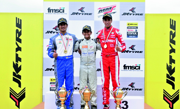 Krishnaraaj Mahadik (left), Yash Aradhya (centre) and Ricky Donison (right) pose with the winners trophy of JK Tyre-FMSCI National Rotax Max Karting Championship second round Krishnaraaj Mahadik (left), Yash Aradhya (centre) and Ricky Donison (right) pose with the winners trophy of JK Tyre-FMSCI National Rotax Max Karting Championship second round